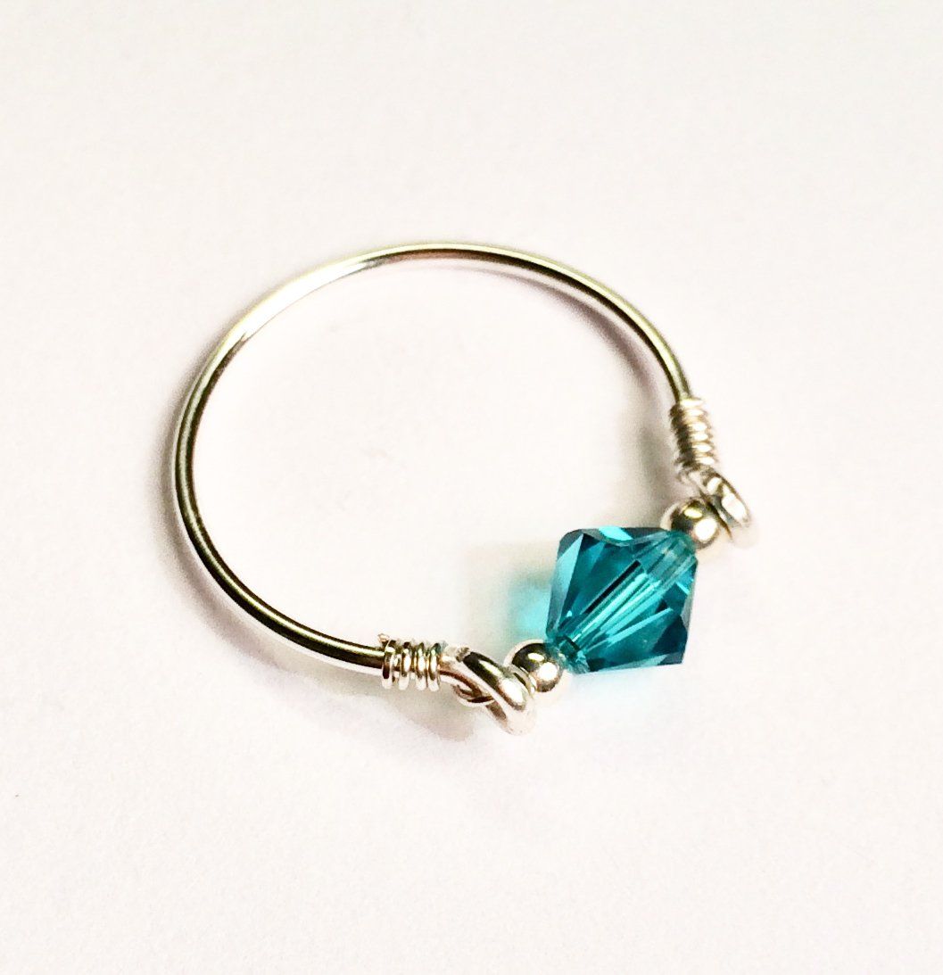 Silver plated wire wrapped rings with shapes & colours of swarovski beads. £6.00