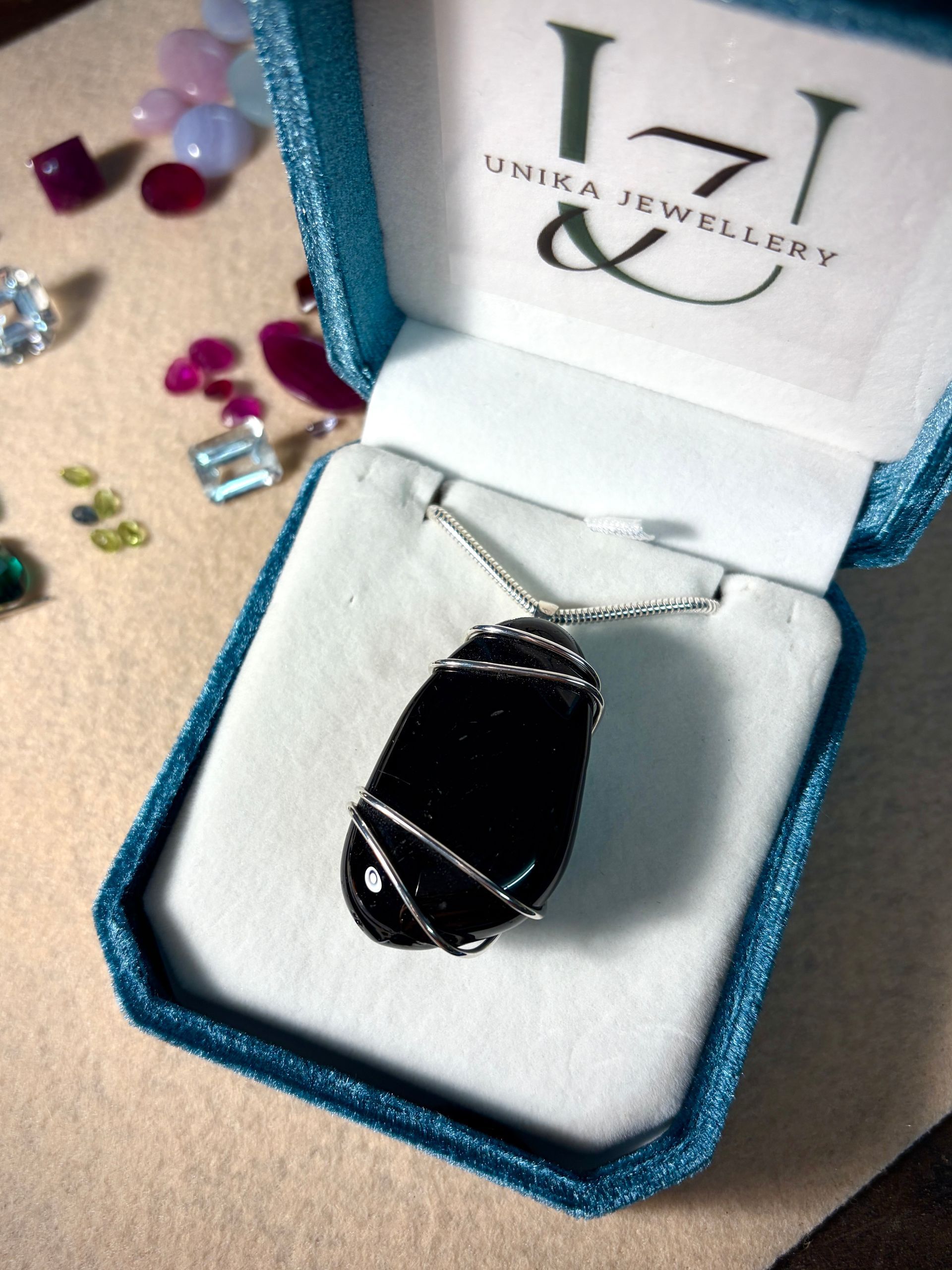 Irregular Shaped Black Stone Wire Wrapped Pendant