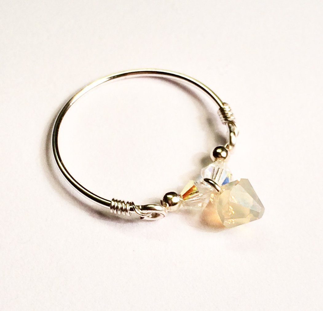 Silver plated wire wrapped rings with shapes & colours of swarovski beads. £6.00