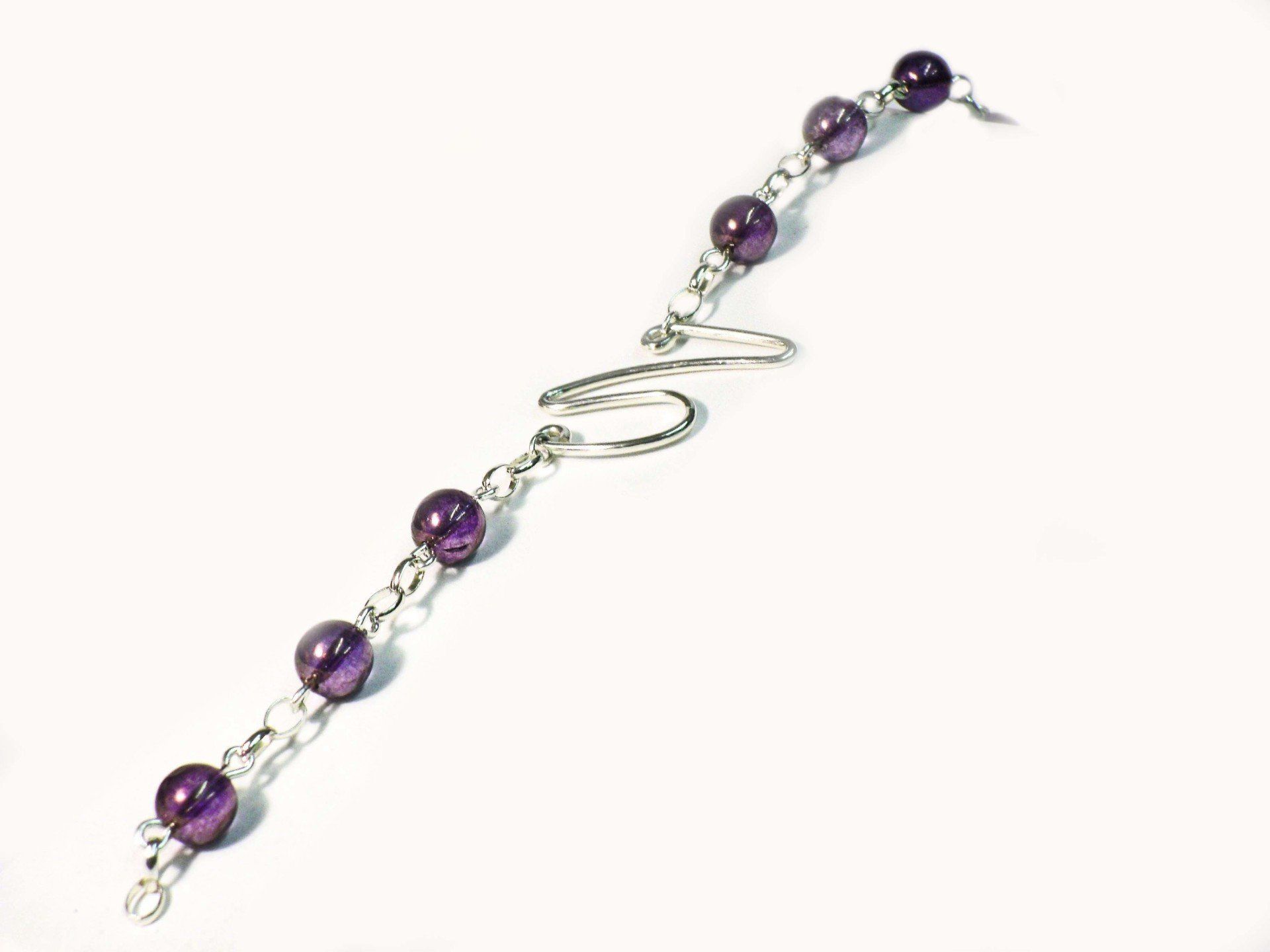 Purple picasso beaded bracelet with sterling silver wavy feature links