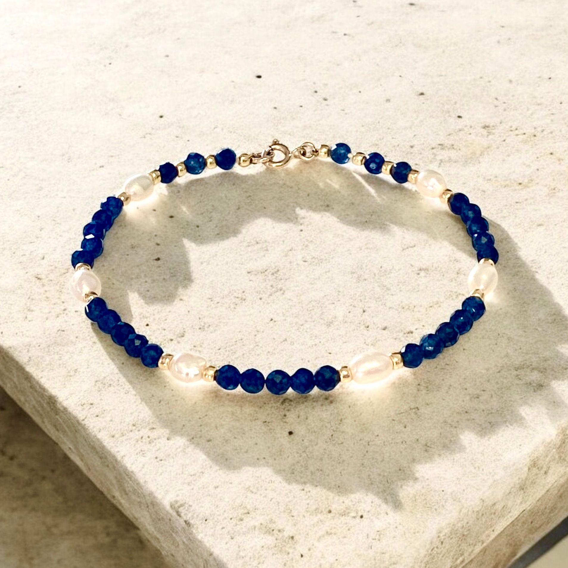 Natural sapphire beads, freshwater pearls and gold bead ankle bracelet.