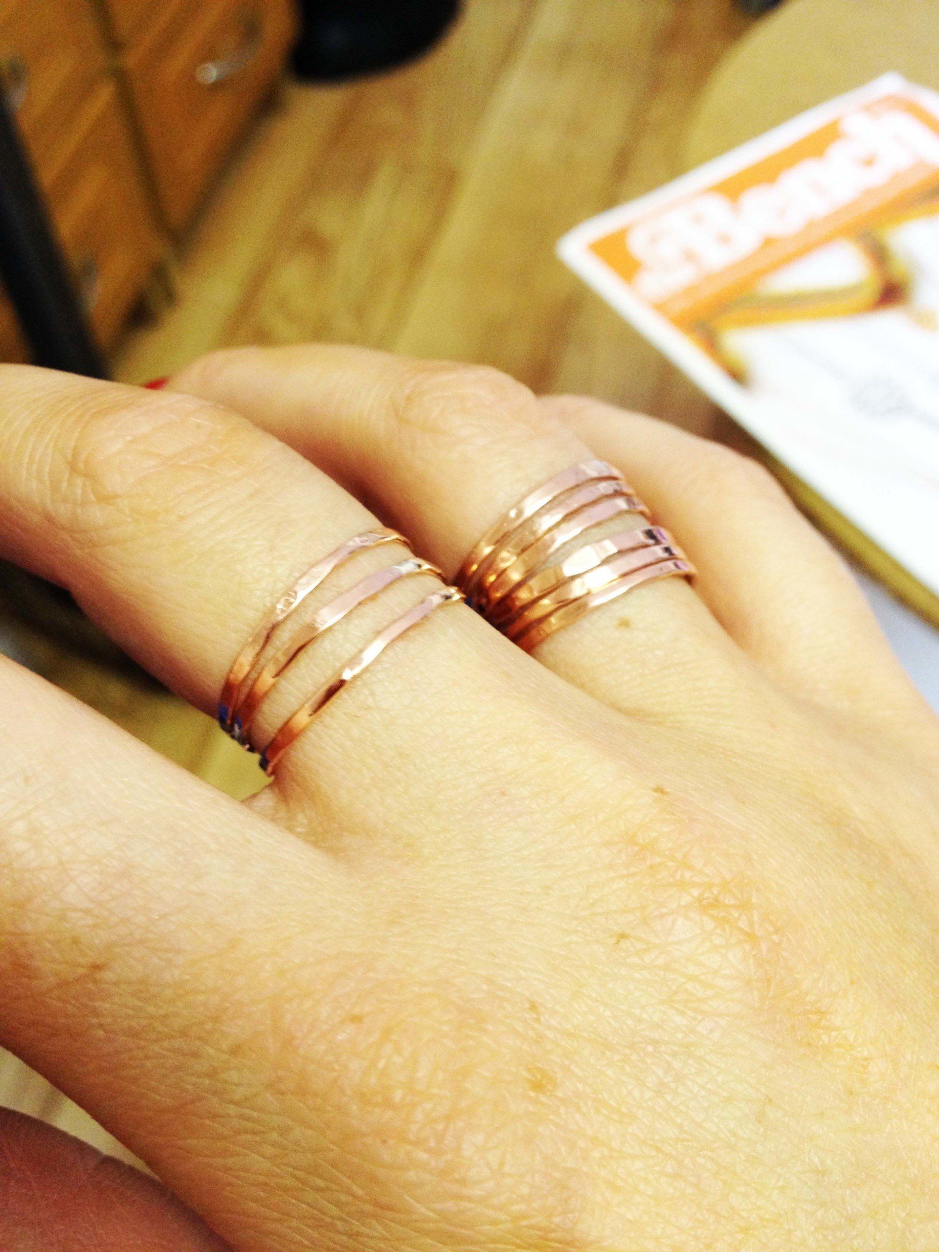 Set of 9 hammered fine copper stacking rings.