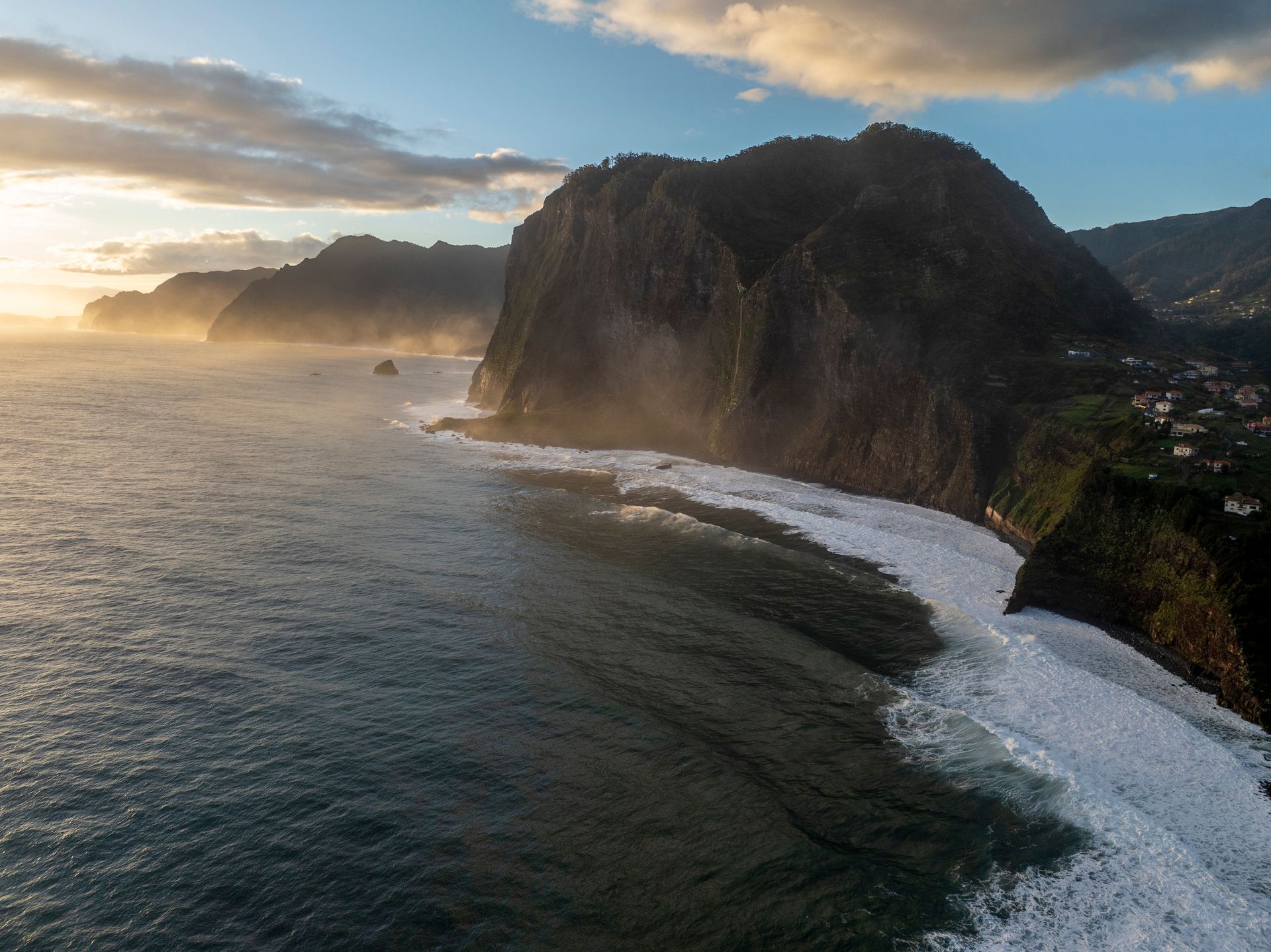 Mist rising into the air at sunrise in Madeira. Photo by Matthew Breiter Photography