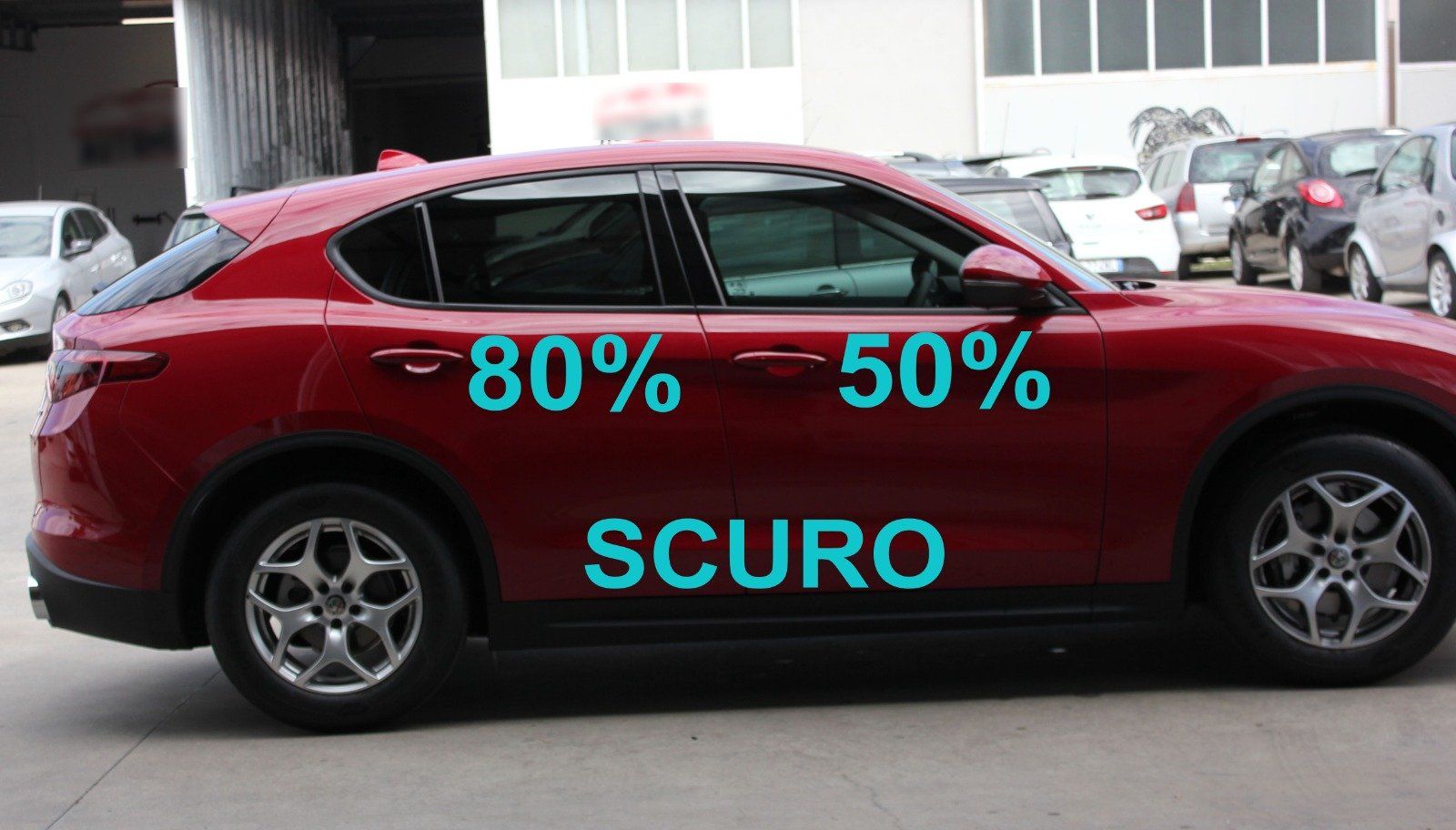 Gradazione  tonalità oscuramento vetri auto con pellicole oscuranti al 80% scuro Alfa Romeo Stelvio rossa