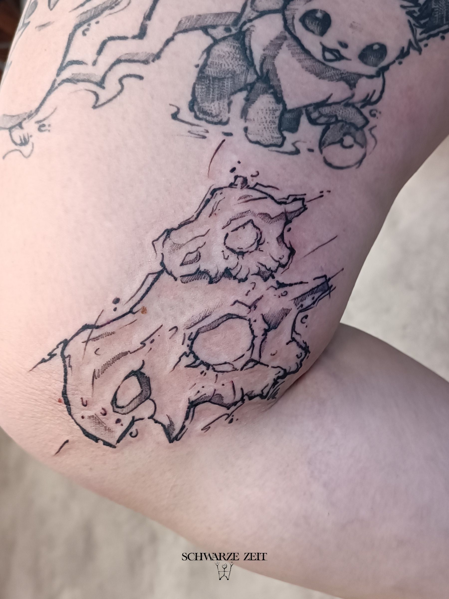 tragosso schädel tattoo aus pokemon