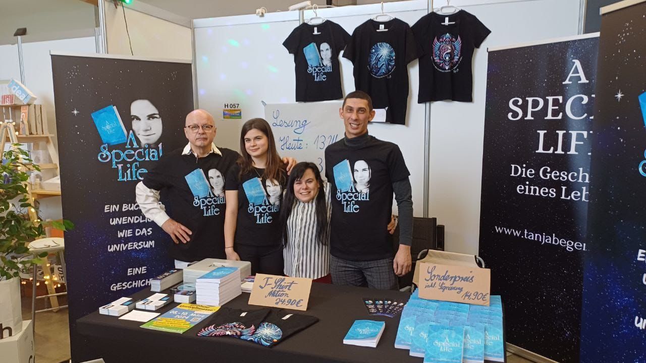 Father Leopold Begerack & best friend Michael Meister with author Tanja Begerack at the sales booth