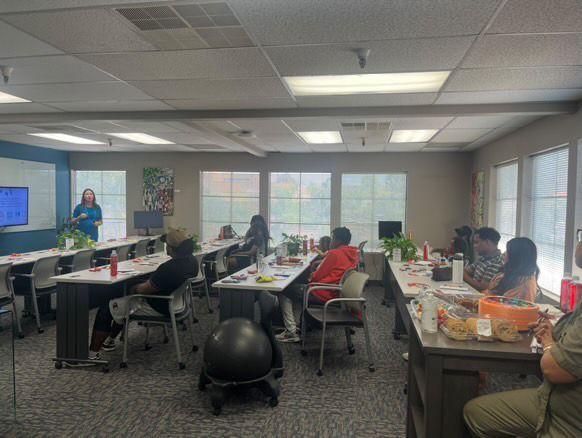 A confident woman speaker addressing a group