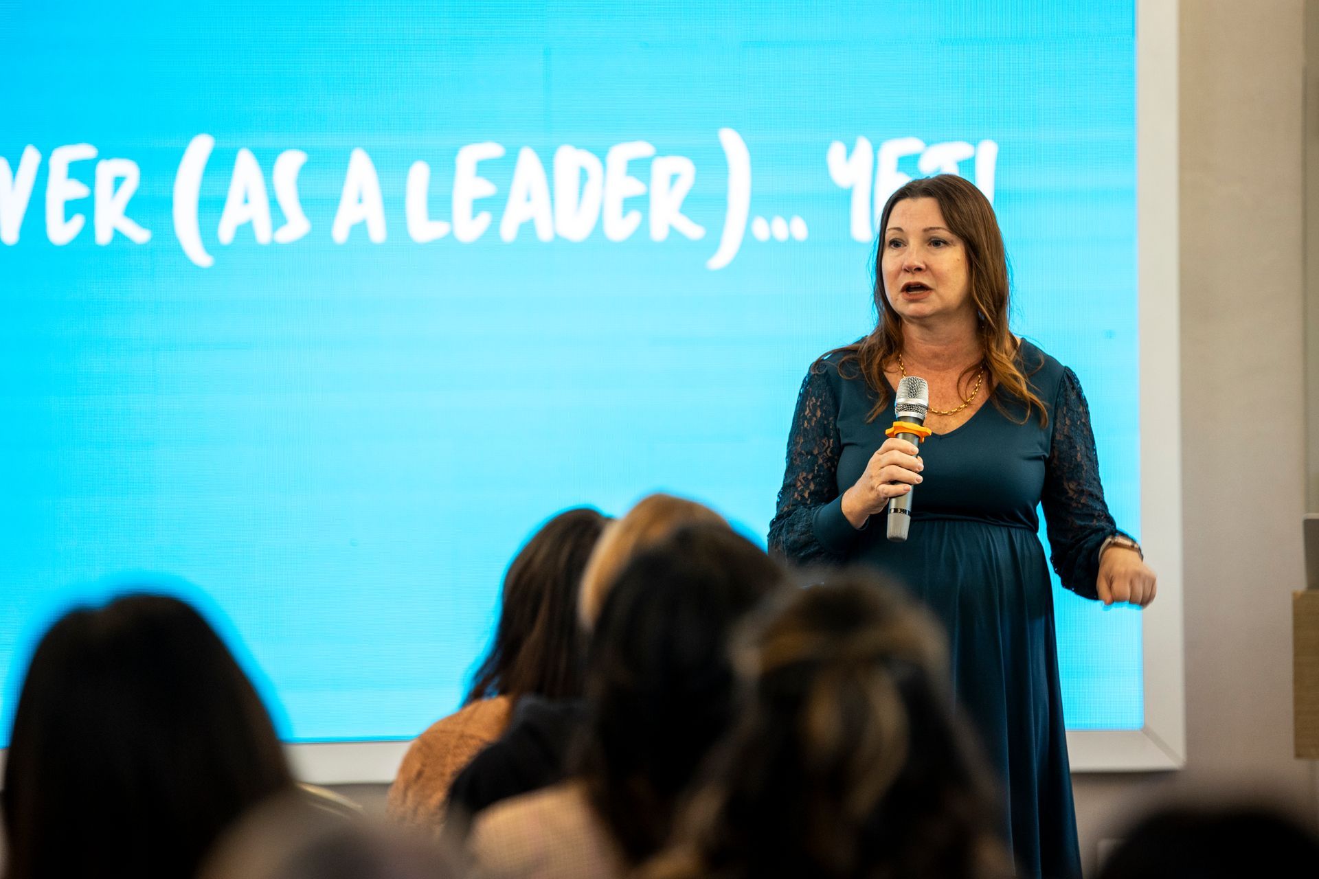 Darlene Hawley speaking on stage