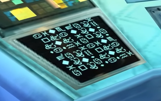 A dark screen on a space station console displaying unreadable symbols.