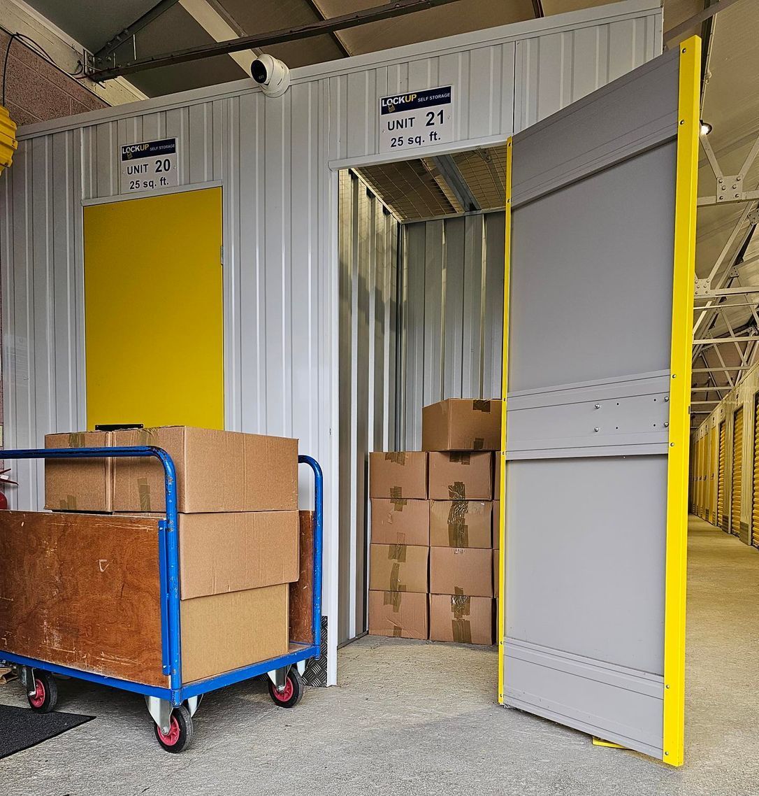 Business storage unit with shelves, boxes and stock