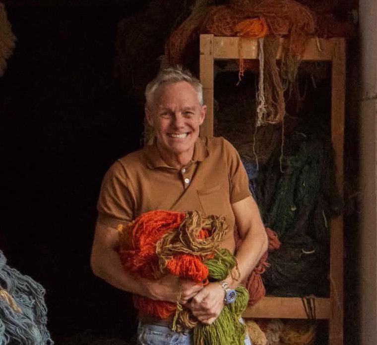 Julian in India making rugs