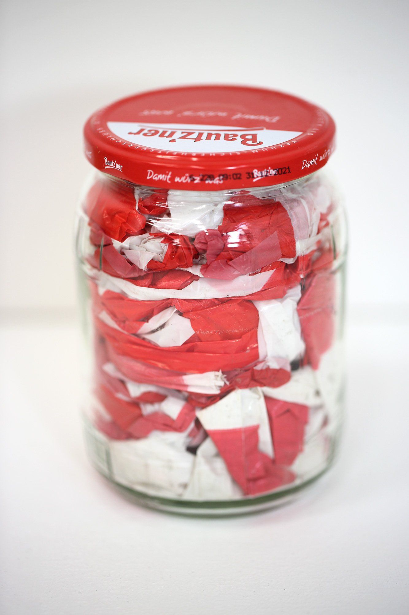 „Barrier Tape in Pickle Jar“ (also „Barrier Tape Object No. 1“) by Sebastian Bieniek (B1EN1EK), the inventor of „Barrier Tape Art“. Created in april 2020. 14 x 8,5 cm. „Barrier Tape in Pickle Jar“ (also „Barrier Tape Object No. 1“) by Sebastian Bieniek (B1EN1EK), the inventor of „Barrier Tape Art“. Created in april 2020. 14 x 8,5 cm.