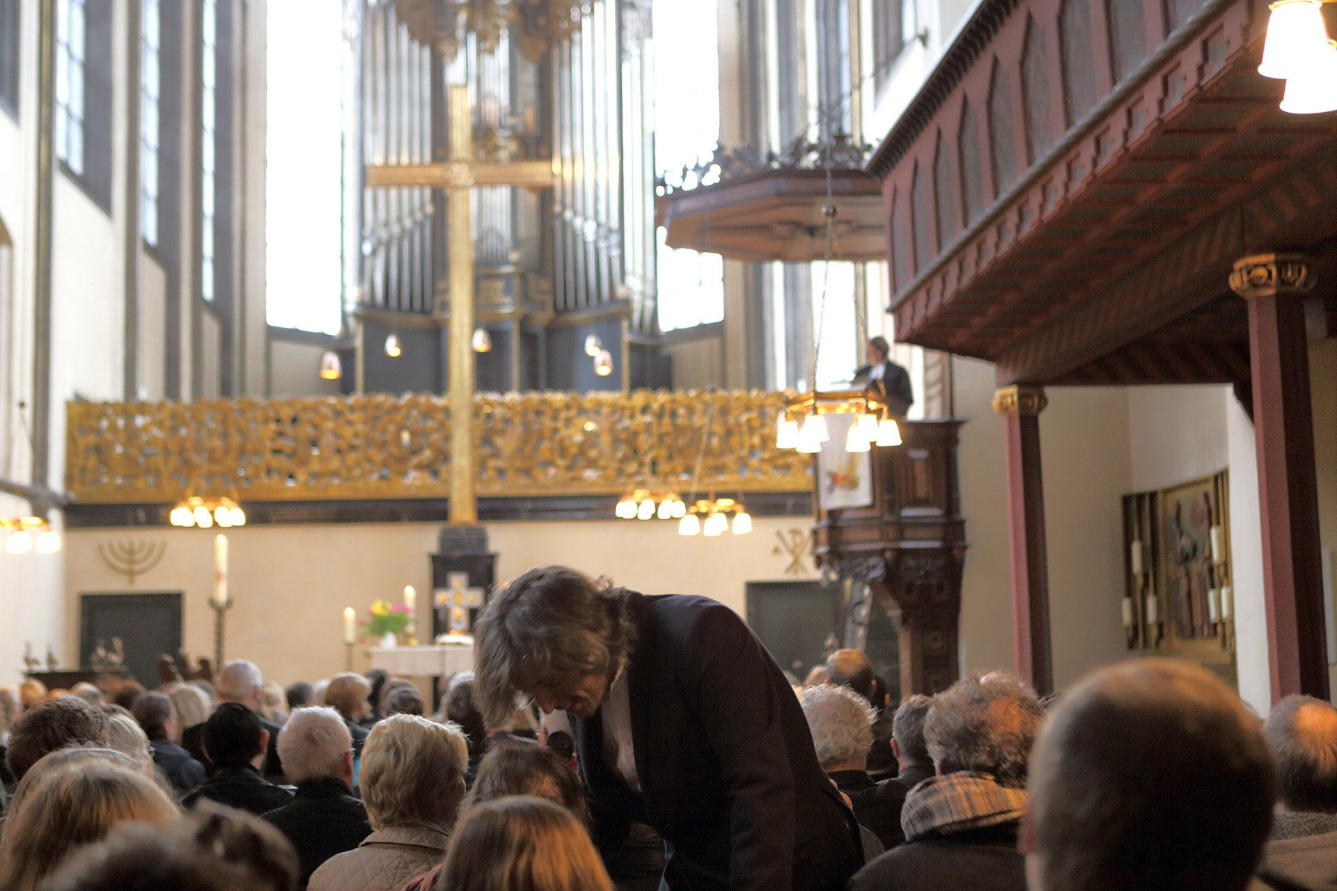 Sebastian Bieniek went from the back to front row during the mass that took place in the University Church of Marburg in 2016 and asked everyone Sebastian Bieniek went from the back to front row during the mass that took place in the University Church of Marburg in 2016 and asked everyone
