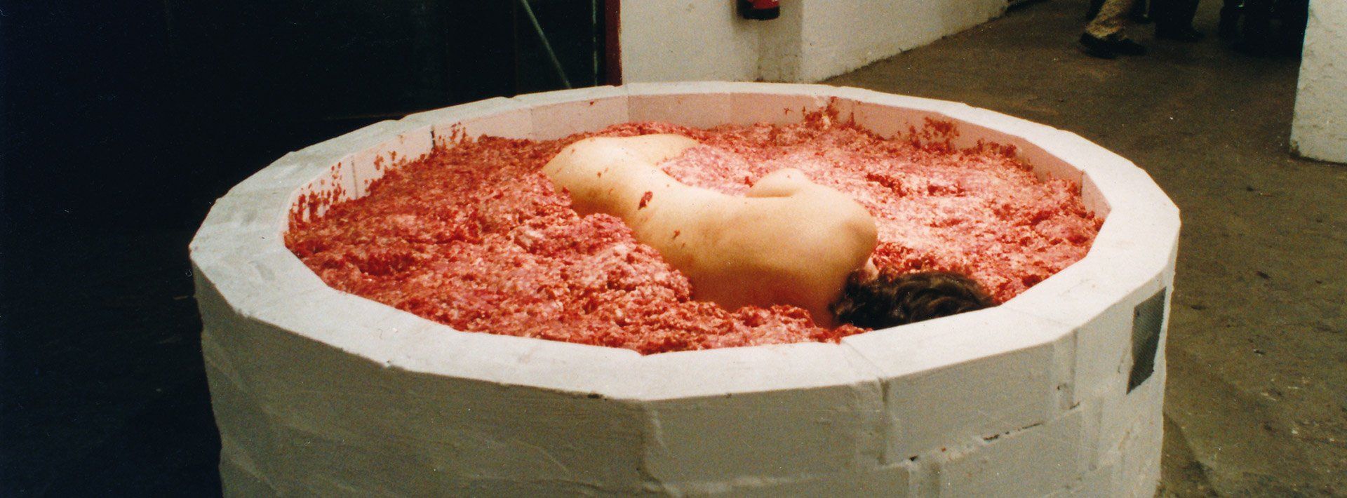 Sebastian Bieniek Performance, 1999, lying in half a ton of minced meat for three days. Kunthaus Tacheles, Berlin. Sebastian Bieniek Performance, 1999, lying in half a ton of minced meat for three days. Kunthaus Tacheles, Berlin.