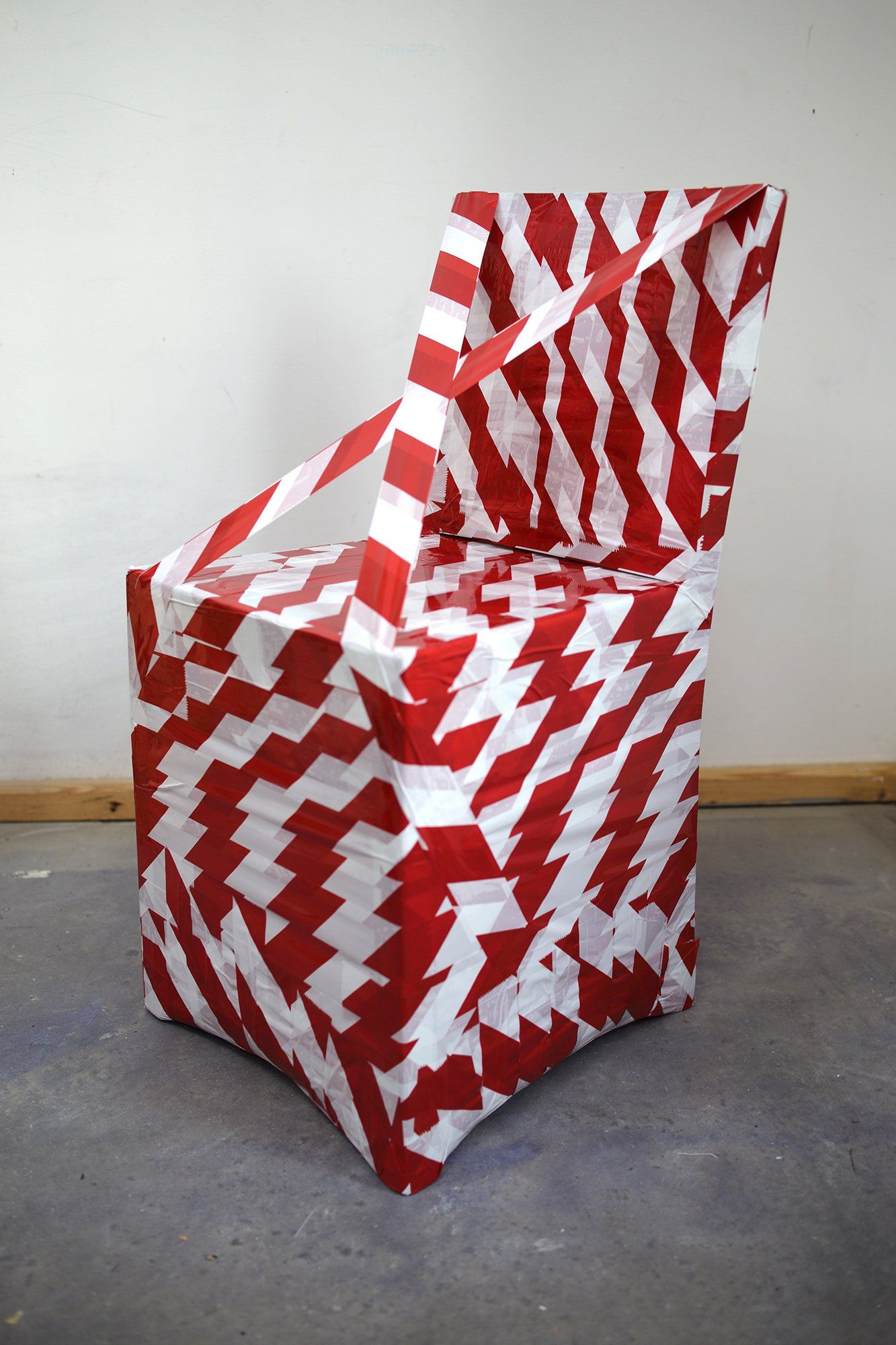 „Barrier Tape Chair“ (also „Barrier Tape Object No. 4“) by Sebastian Bieniek (B1EN1EK), the inventor of „Barrier Tape Art“. Created in april 2020. 80 x 40 x 39 cm. „Barrier Tape Chair“ (also „Barrier Tape Object No. 4“) by Sebastian Bieniek (B1EN1EK), the inventor of „Barrier Tape Art“. Created in april 2020. 80 x 40 x 39 cm.
