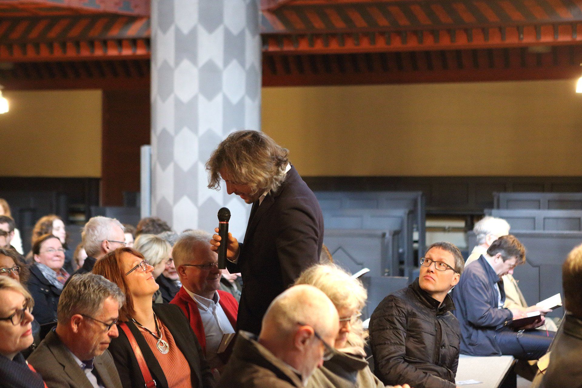 Sebastian Bieniek went from the back to front row during the mass that took place in the University Church of Marburg in 2016 and asked everyone Sebastian Bieniek went from the back to front row during the mass that took place in the University Church of Marburg in 2016 and asked everyone