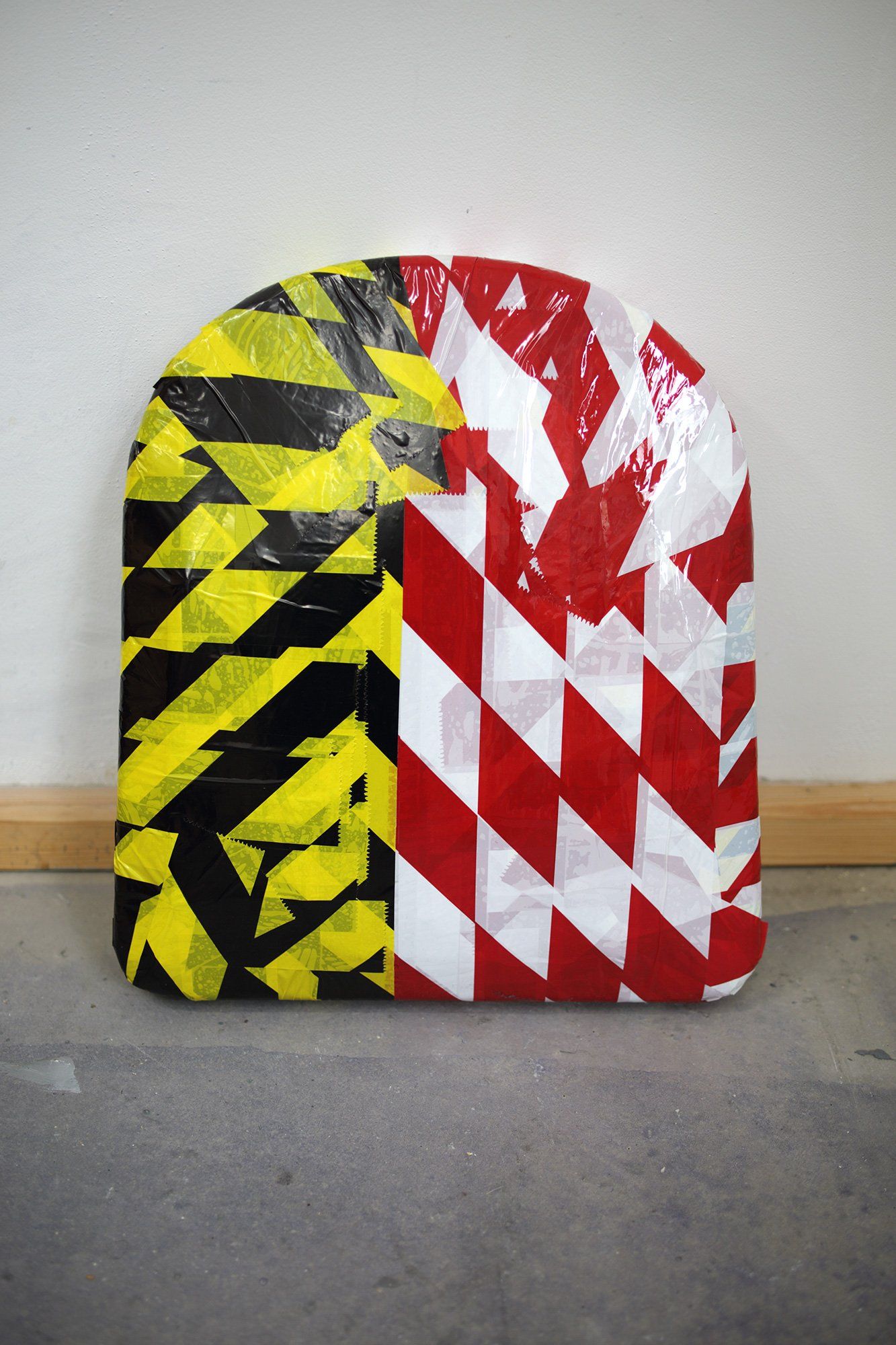 „Barrier Tape Object No. 5“ by Sebastian Bieniek (B1EN1EK), the inventor of „Barrier Tape Art“. Created in april 2020. 43 x 38 x 5,5 cm.