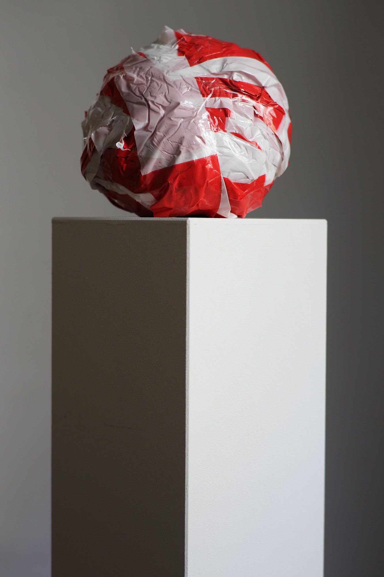 „Barrier Tape Ball No. 1“ (also „Barrier Tape Object No. 7“) by Sebastian Bieniek (B1EN1EK), the inventor of „Barrier Tape Art“. Created in may 2020. Size: 21 cm. „Barrier Tape Ball No. 1“ (also „Barrier Tape Object No. 7“) by Sebastian Bieniek (B1EN1EK), the inventor of „Barrier Tape Art“. Created in may 2020. Size: 21 cm.