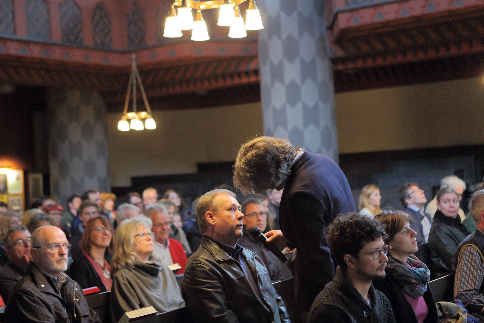 Sebastian Bieniek went from the back to front row during the mass that took place in the University Church of Marburg in 2016 and asked everyone Sebastian Bieniek went from the back to front row during the mass that took place in the University Church of Marburg in 2016 and asked everyone