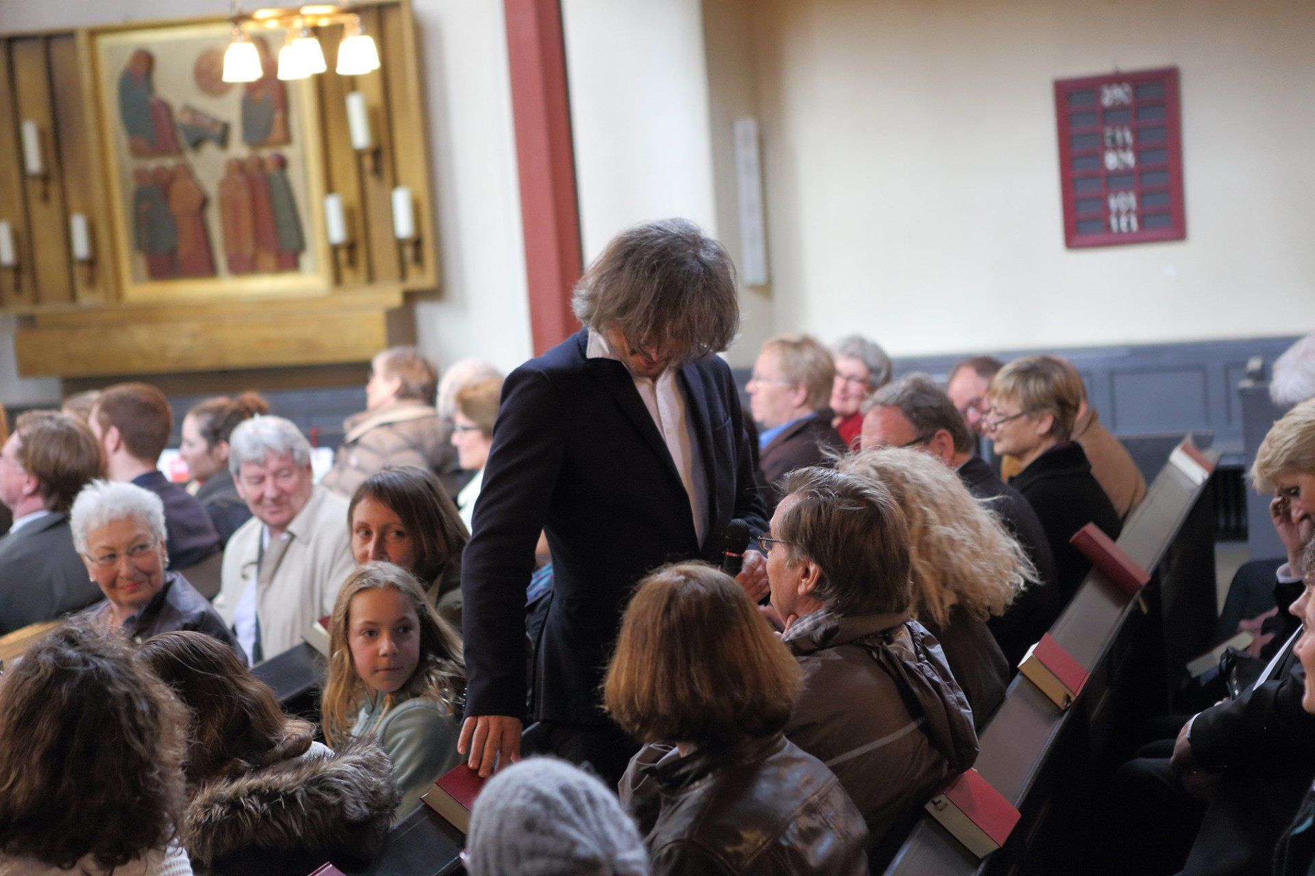 Sebastian Bieniek went from the back to front row during the mass that took place in the University Church of Marburg in 2016 and asked everyone Sebastian Bieniek went from the back to front row during the mass that took place in the University Church of Marburg in 2016 and asked everyone