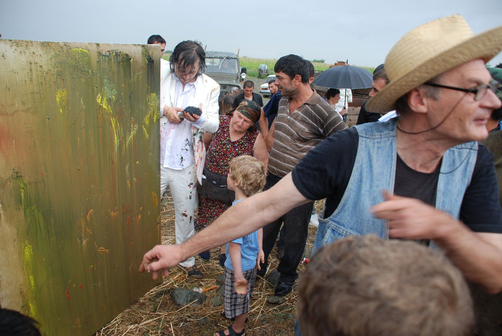 Pona, Georiga, 2011. Performance by Sebastian Bieniek on a Cattle Market. The people who make up the cattle market were encouraged to capture the cattle market on a painting. Pona, Georiga, 2011. Performance by Sebastian Bieniek on a Cattle Market. The people who make up the cattle market were encouraged to capture the cattle market on a painting.