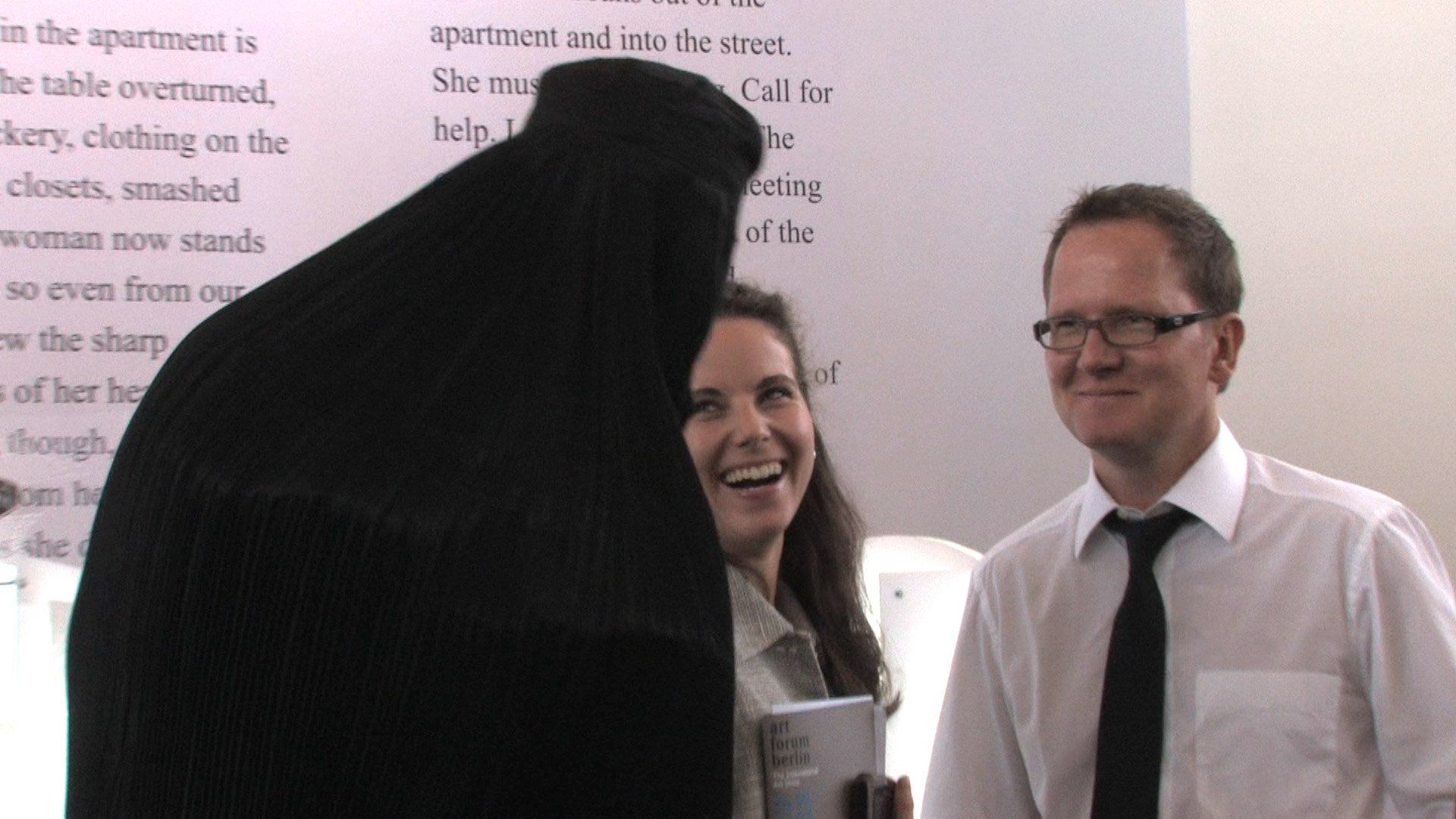 Sebastian Bieniek performance in a burqa at the Art Forum Berlin 2009 art fair.