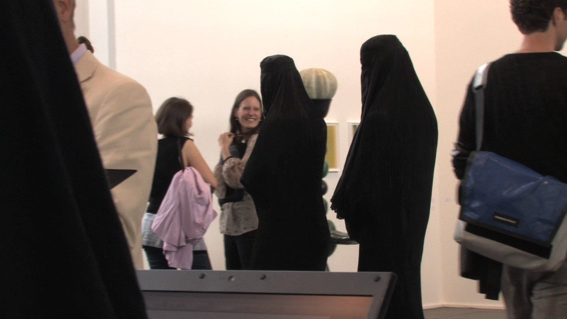 Sebastian Bieniek performance in a burqa at the Art Forum Berlin 2009 art fair.