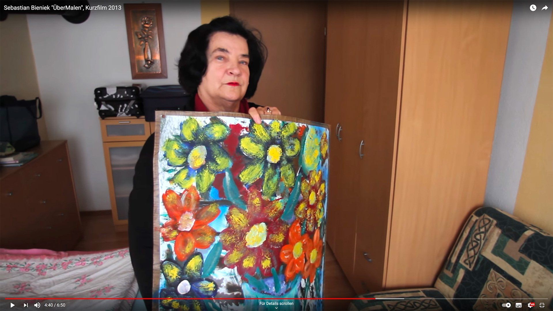 Sebastian Bieniek's mother showing him proudly the plowers that she pained over his photographs in 2012 and that became Sebastian Bieniek's mother showing him proudly the plowers that she pained over his photographs in 2012 and that became