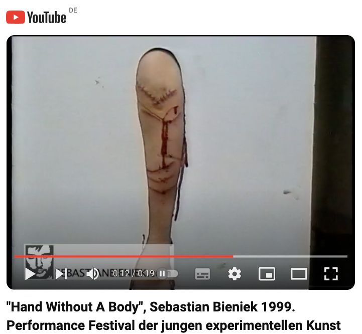 Sebastian Bieniek Performance, 1999, Hand without a Body, blutsäule, blutet, Festival der Jungen experimentellen Kunst, Postfuhramt Berlin, Blut, aufgeschnittene Hand, geritzt Sebastian Bieniek Performance, 1999, Hand without a Body, blutsäule, blutet, Festival der Jungen experimentellen Kunst, Postfuhramt Berlin, Blut, aufgeschnittene Hand, geritzt