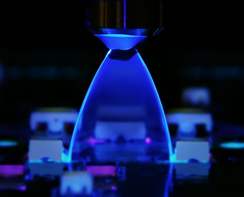 Detailaufnahme Materialstrahl bei einer Coating-Applikation