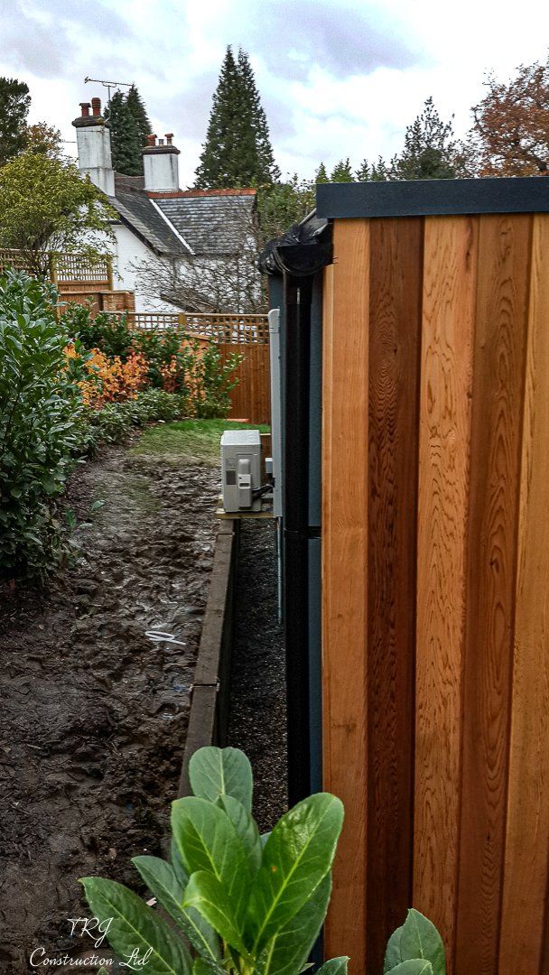 Red cedar garden room constructed with SIP panels, showcasing a modern and sustainable design
