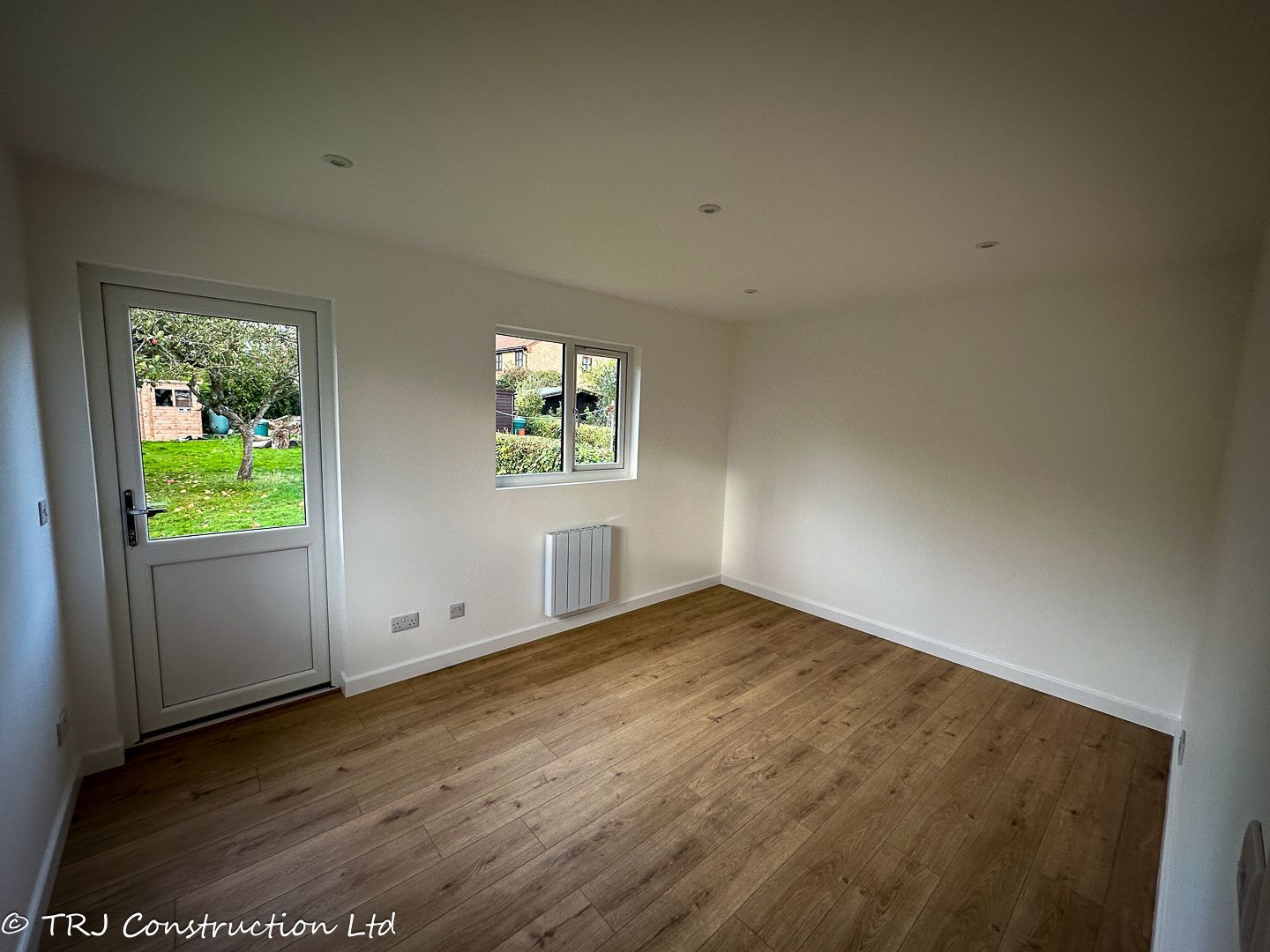 Bespoke garden room converted into a home office by TRJ Construction