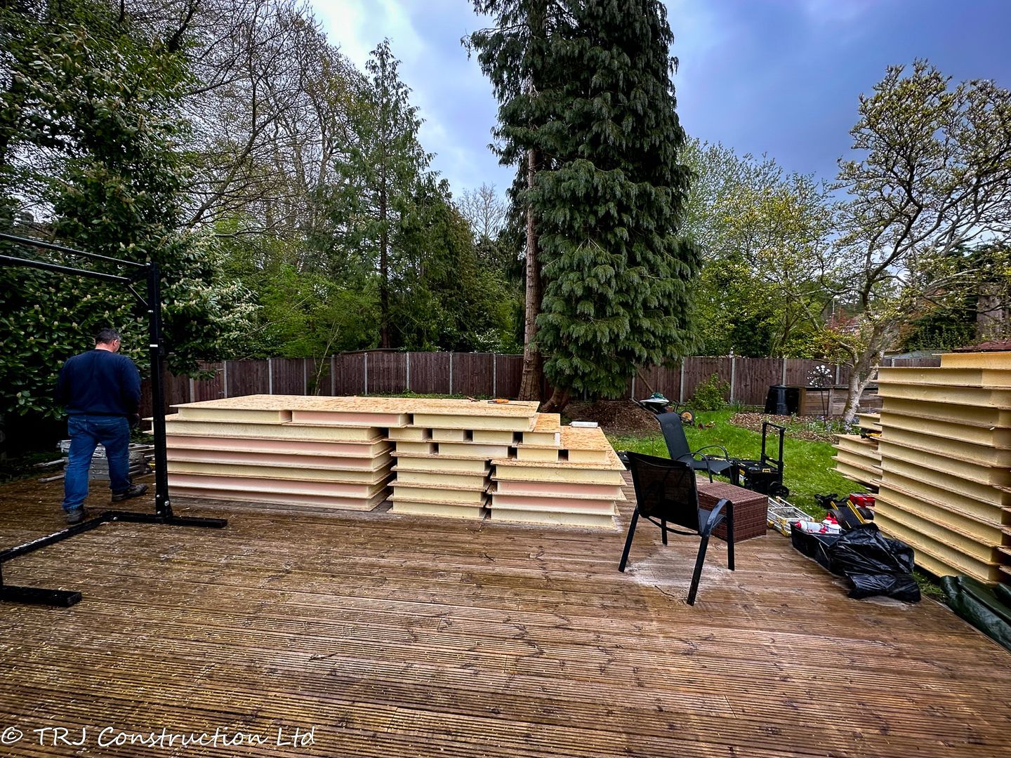 SIP panels stacked and ready for eco-friendly home construction.