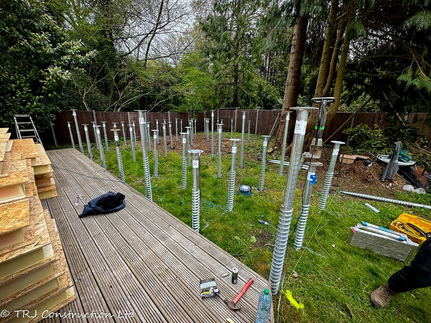 SIP panels stacked and ready for eco-friendly home construction.