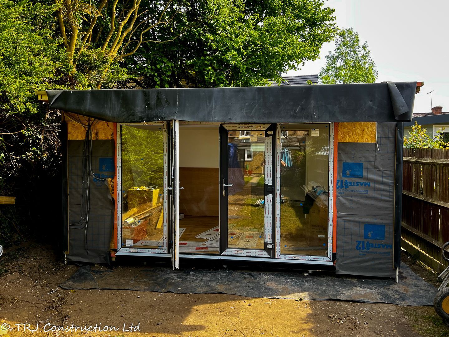 Bespoke garden room converted into a home office by TRJ Construction