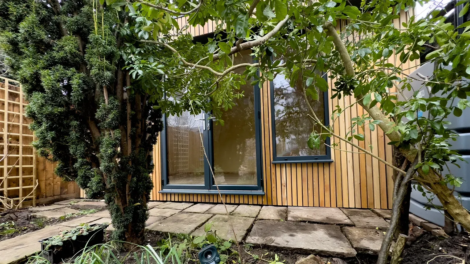 small garden with garden room