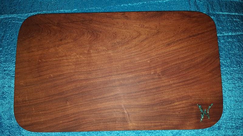 wooden cutting board with turquoise inlay