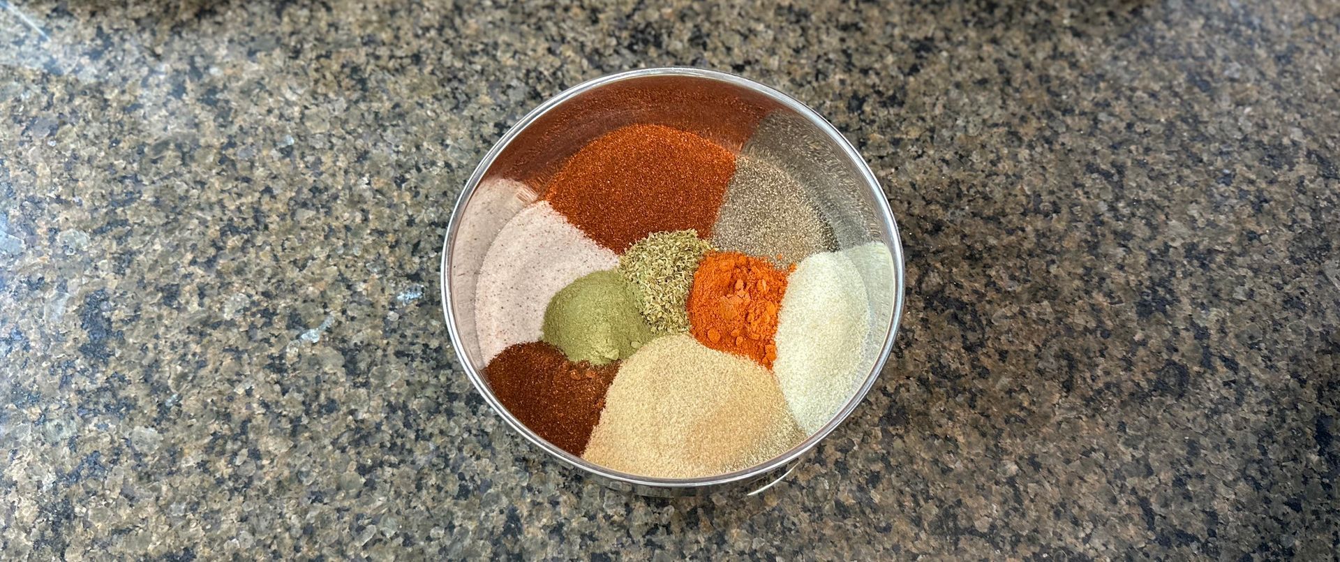 homemade cajun seasoning blend in mixing bowl not stirred