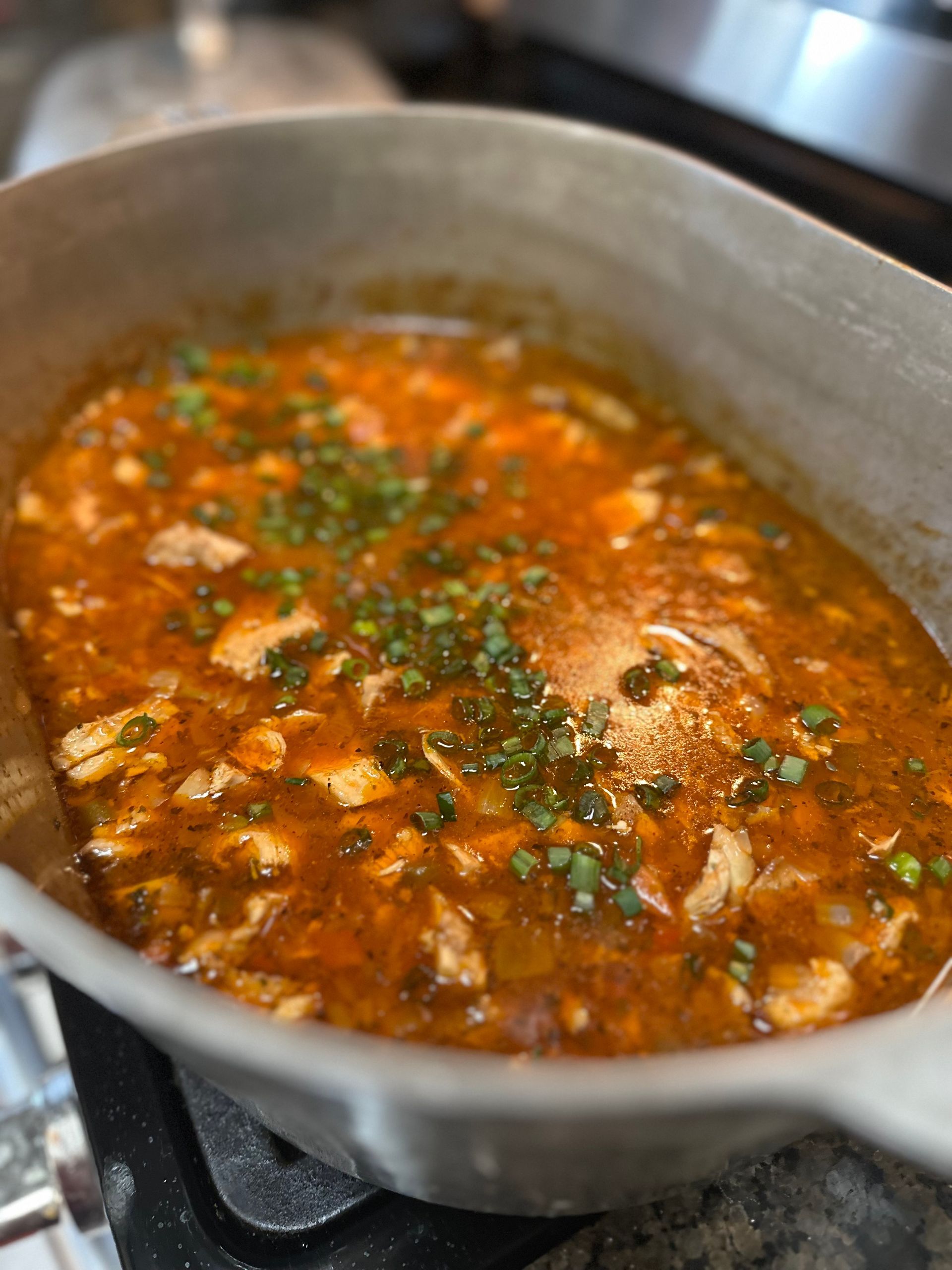 chicken tortilla soup in magnalite pot