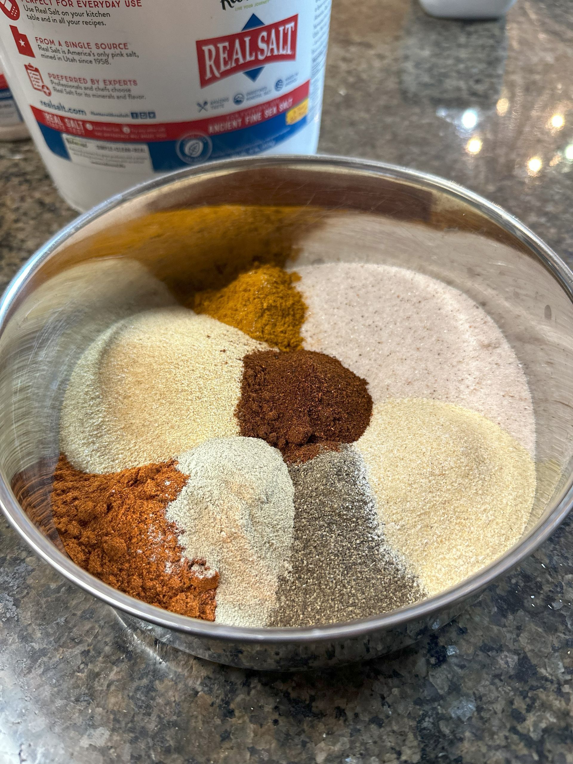 Tha Stuff seasoning blend in a mixing bowl