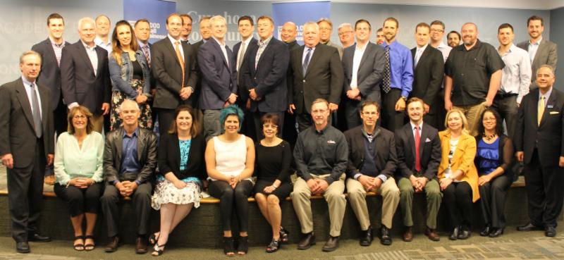 Group of Business Men and Women in Professional Attire