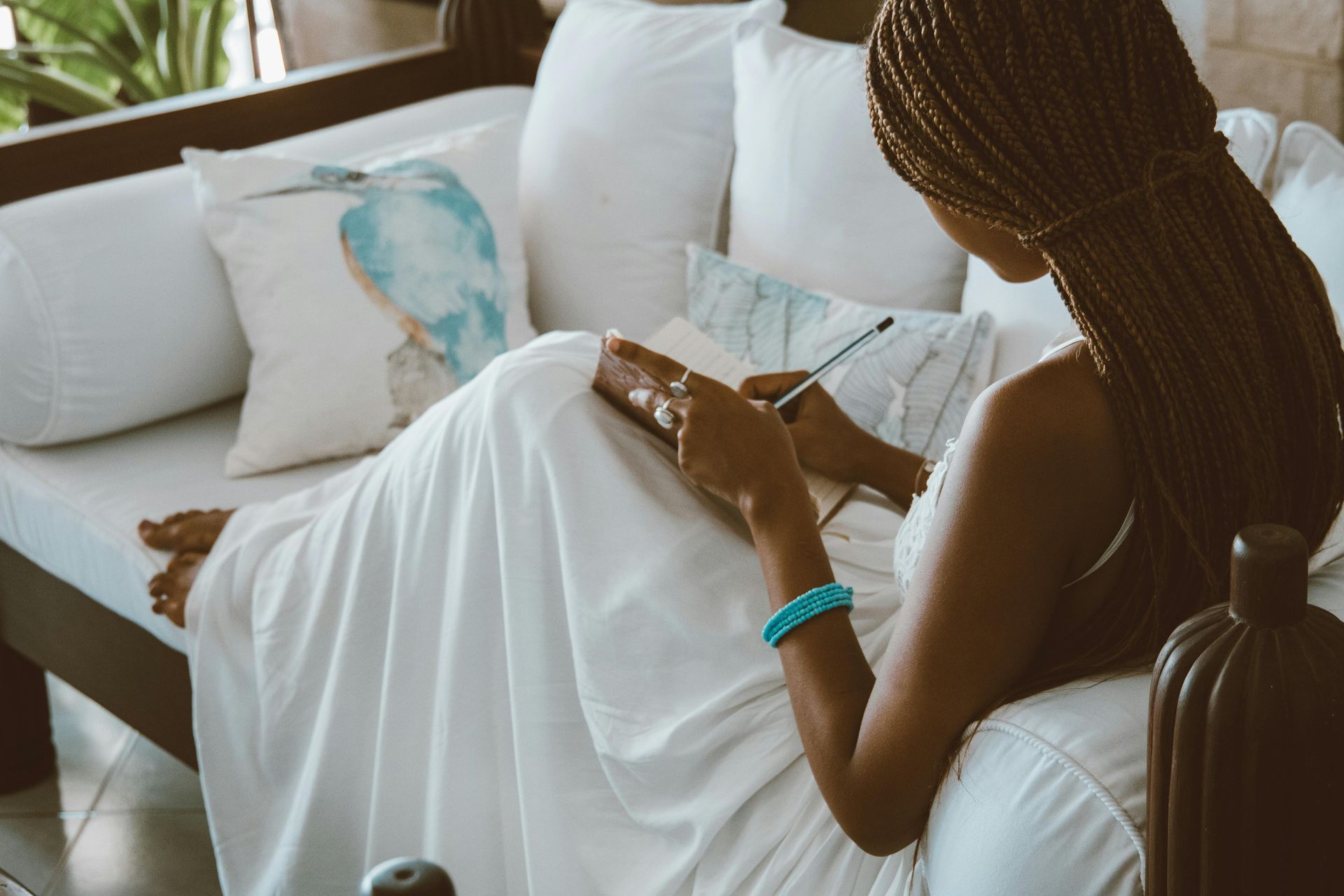 A person writing a book