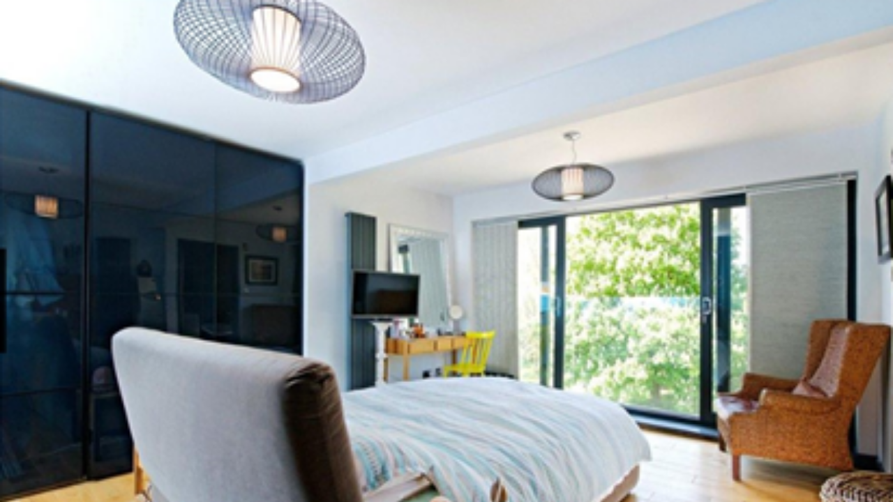 Bedroom with large glass windows