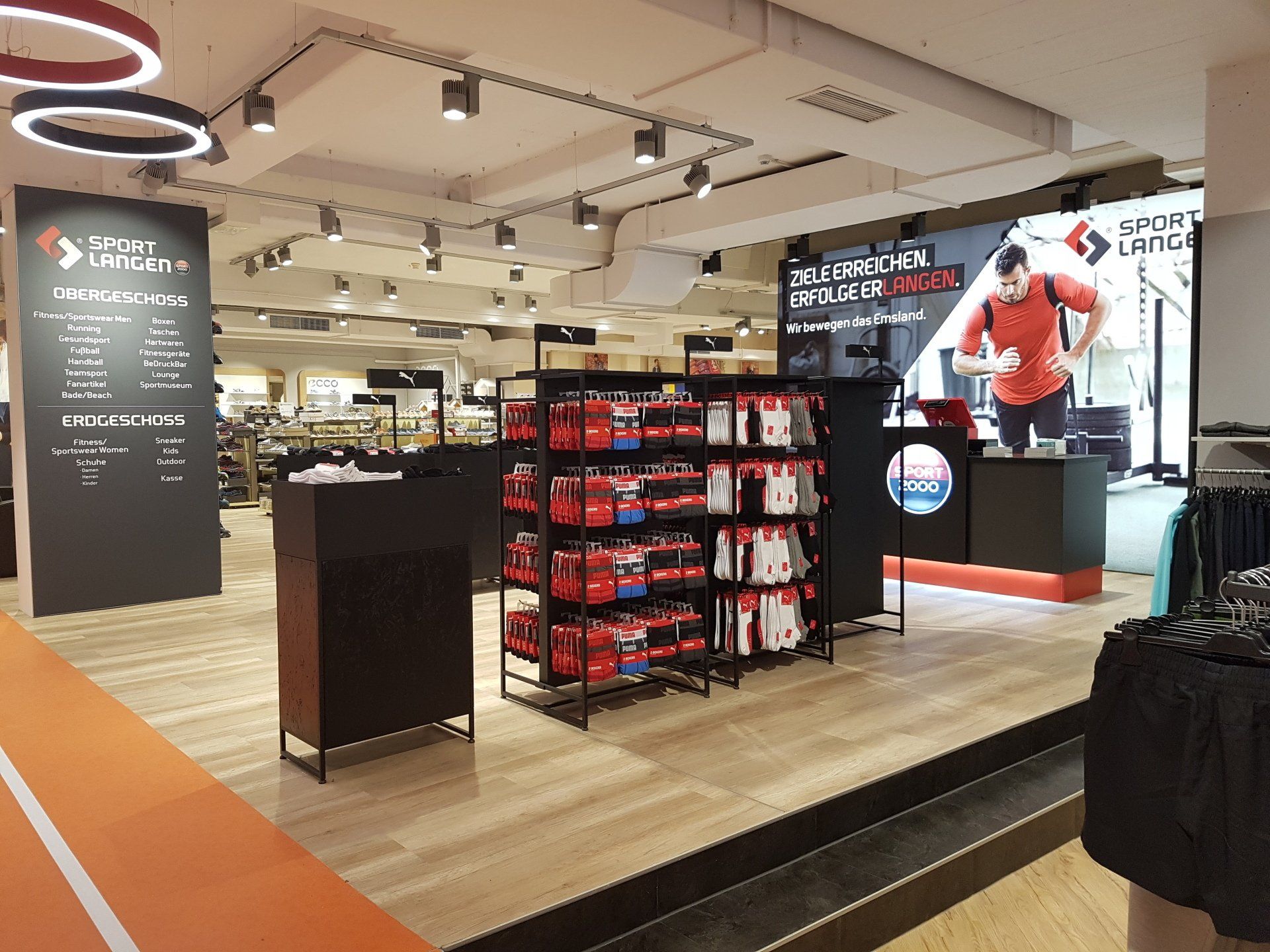 Logo Licht, Store-Inszenierung, Beleuchtung, Lampen, Strahler, Warenpräsentation