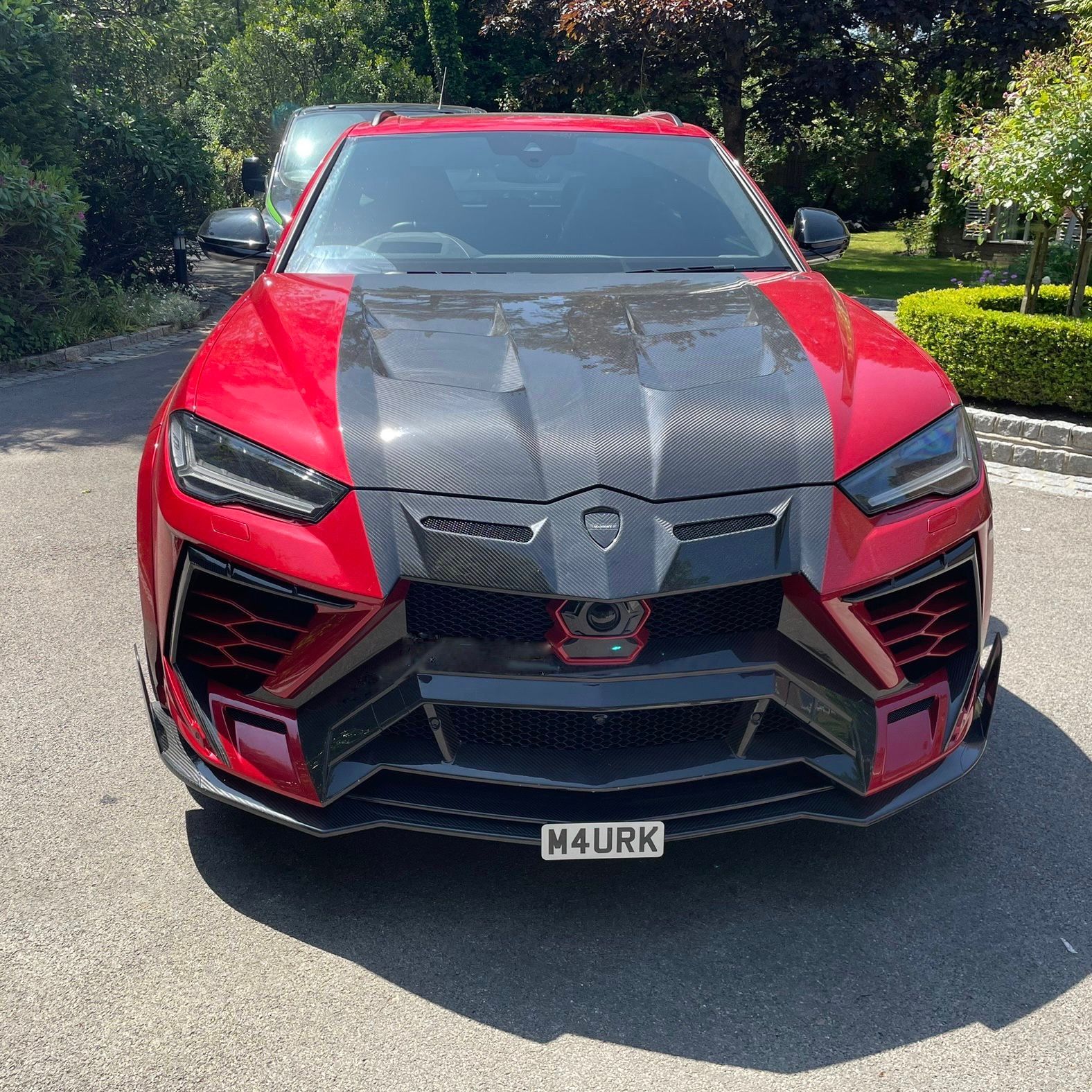 Lamborghini Urus with a Mansory Kit fitted front license plate support