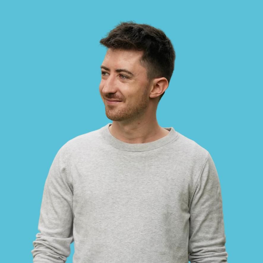 Life Coach Ciaran Barry on Blue Background
