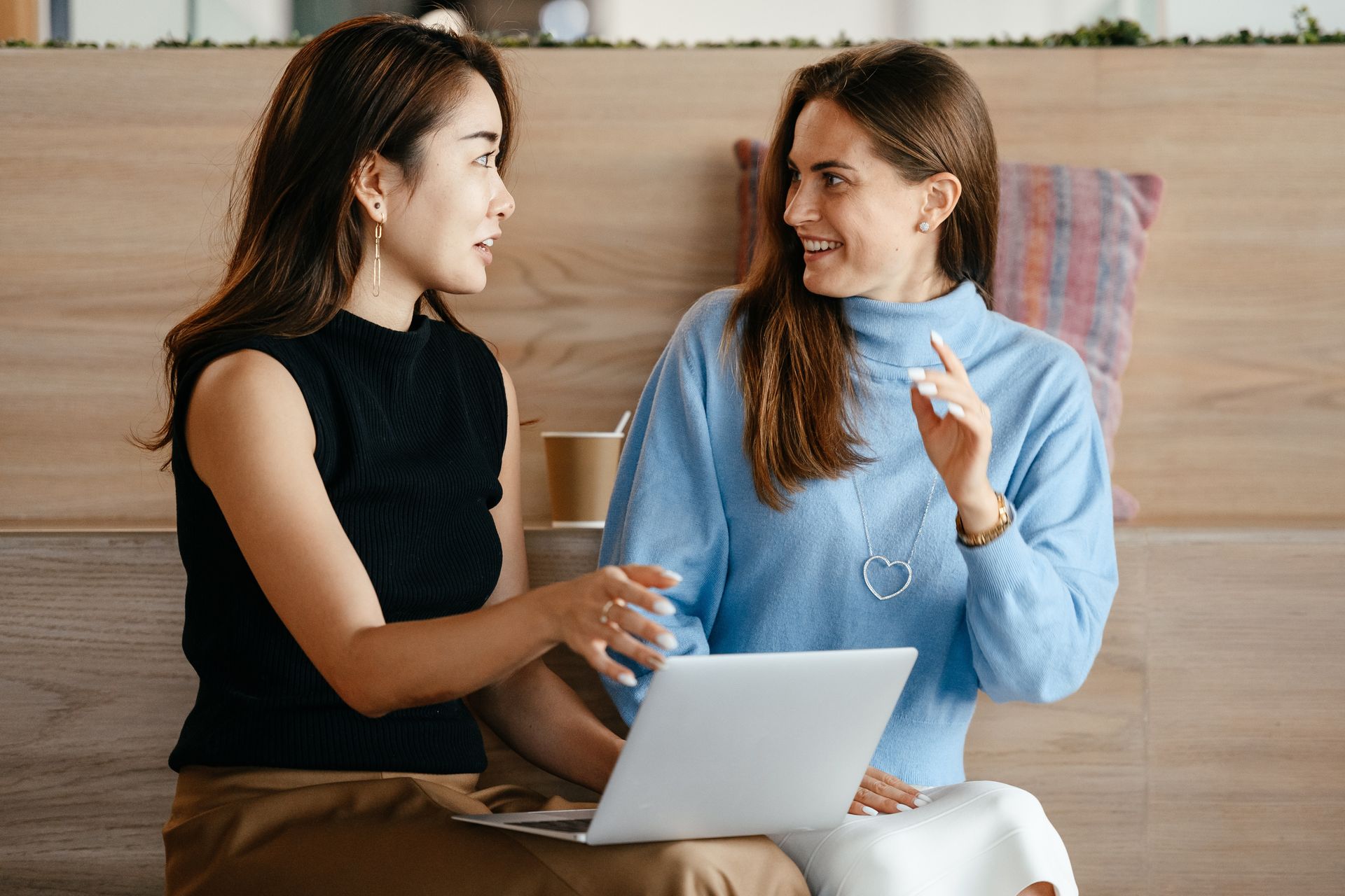 Two women discussing an idea