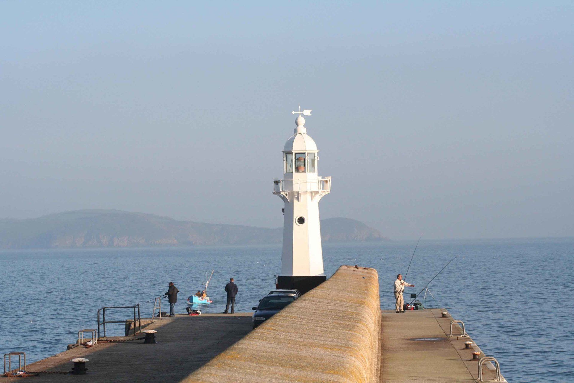 Mevagissey lighthouse Cornwall in photo gallery by L A Kent author of Rogue Flamingo