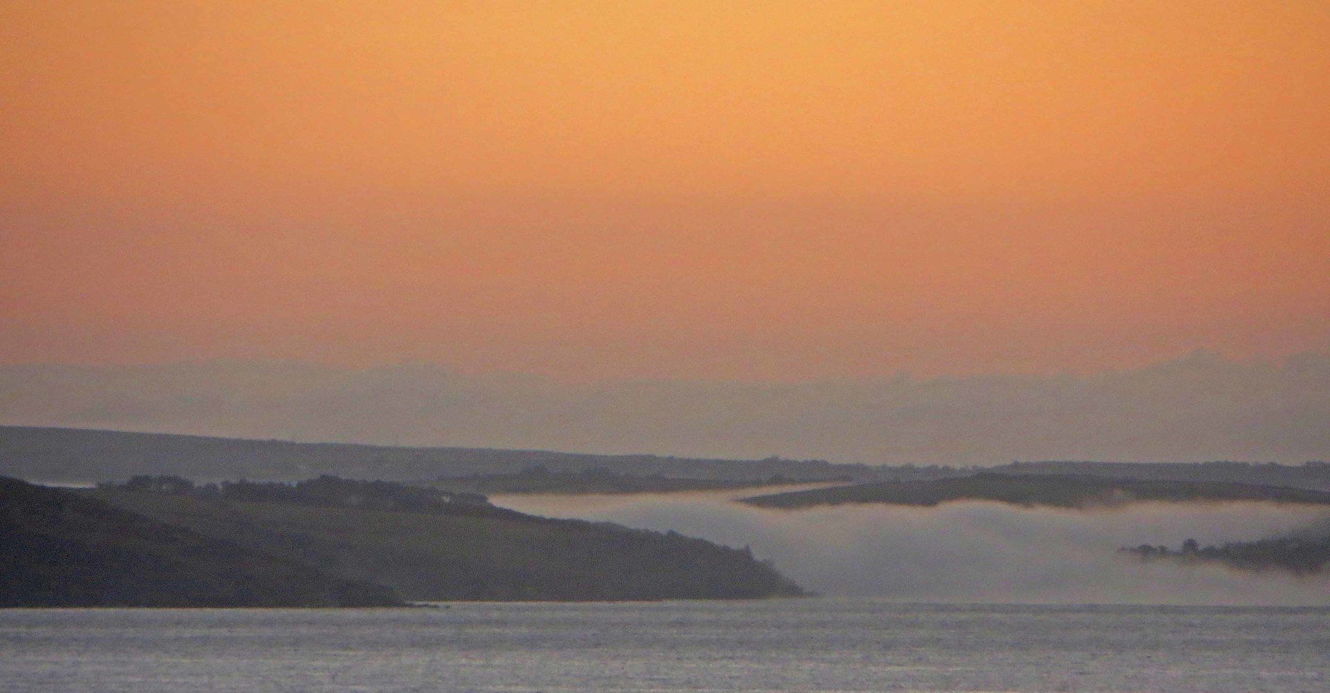 early morning mist rolls down to the sea from the River Fowey Silent Gull by L A Kent Inspector Treloar Mysteries