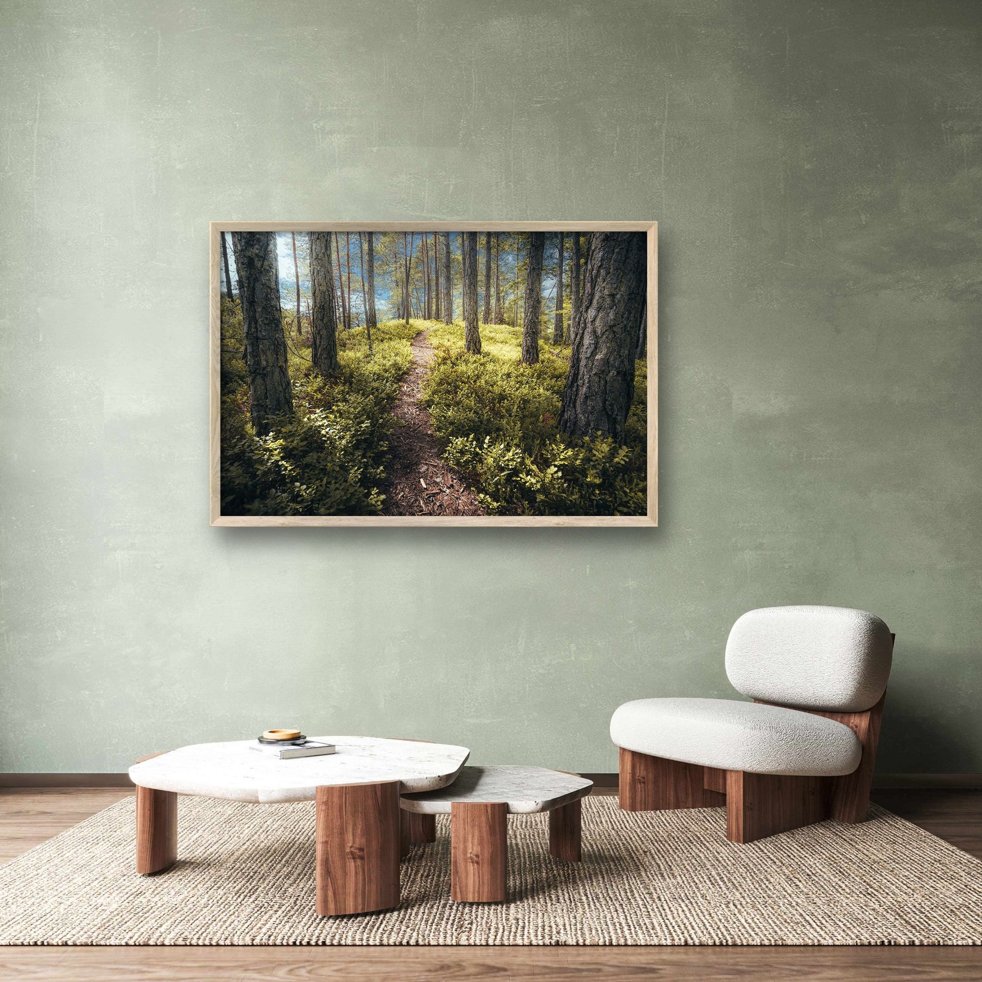 Mural with a dreamy forest scene in a living room Mural featuring a dreamy forest scene hanging in a living room.